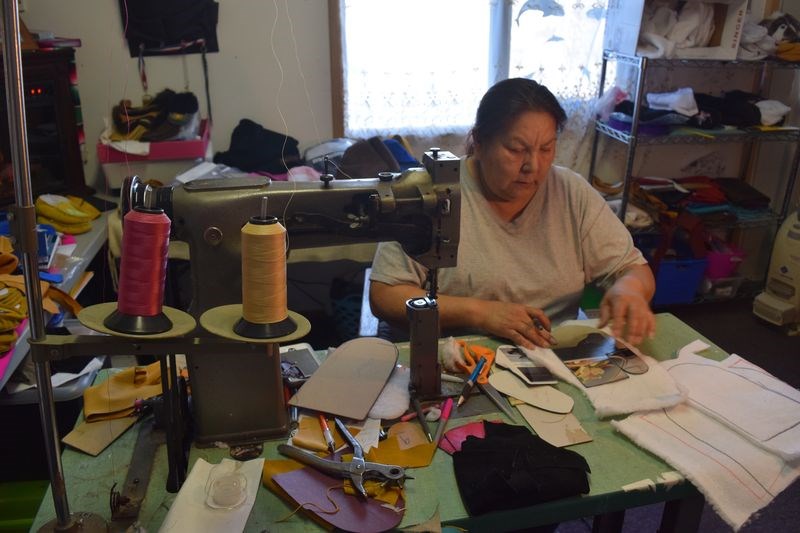 Joann Severight keeps busy almost year round making leather moccasins, mukluks, boots and gauntlets, working from a workshop in her home at Cote First Nation.