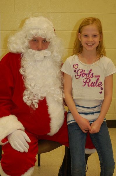 Santa and Mollie Jaeb Girls rule and Mollie Jaeb had fun explaining that to Santa on December 5.