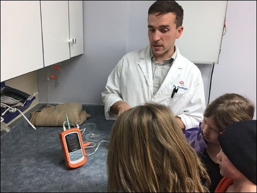 Dr. Perlinger of Lakeland Veterinary Services explains procedures used in the veterinary clinic to treat ill or injured animals. Photos by Rachel Florence