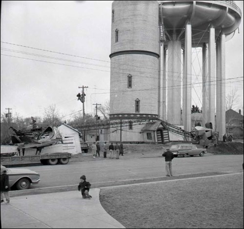 North Battleford’s first and second water tower stood together for about 11 years when a the original tower was torn down. There was some trouble with the deconstruction when a crane crashed. Photo courtesy of the North Battleford City Archives