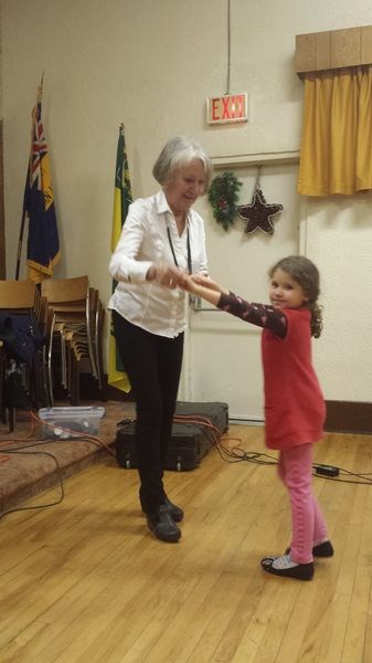 Younger persons attending the Norquay Legion’s Christmas party were encouraged to dance with Legion members so Phoenix Galay had a dance with Laura Dahl.