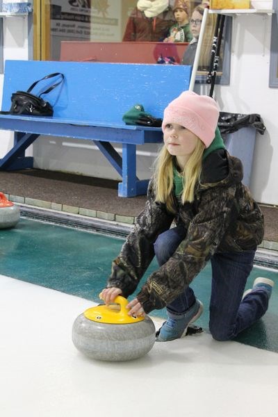 Mia Butterfield brushed up on her curling skills at the Norquay curling rink during the open curling time on December 5 held in conjunction with the Norquay Santa Day.