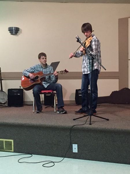 Entertaining again this year during the Pelly Carol Festival were the Reader brothers. Levi showed off his skills by simultaneously playing the piano and banjo, while Wyatt played the bass fiddle and the violin.