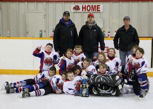 The Atom Cougars hosted a home tournament on Saturday, Jan. 9, and Sunday, Jan. 10, where they came out victorious having earned the win over Estevan Lightning. (Not in order) Celebrating are Mitch Himmelspach, Daine Thomas, Blake Robertson, Jakson Humphries, Kaden Piper, Grady Benjamin, Chase Robertson, Kale Arndt, Samantha Colpitts, Tyrell Dixon, Ty Fehrenbach, Mason Barta, and Max Waugh along with coaches Wade Robertson, Chris Piper, and Tyler Fehrenbach.