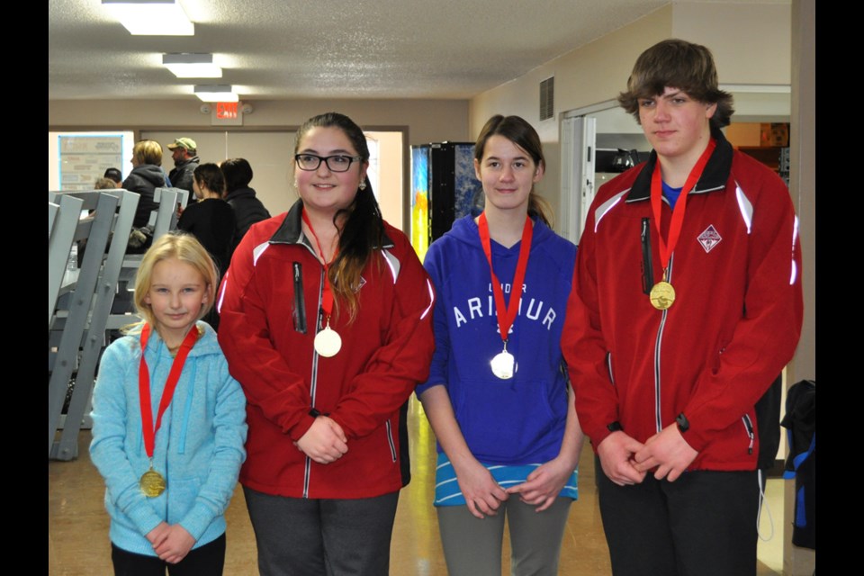 Team Janssen, with from left, Kristen Carlson, Megan Parsons, Sarah Leverton and Kolby Janssen, missing is Conner Piche, took home the U15 gold medal after posting a 4-0 record at the Youth Spiel.