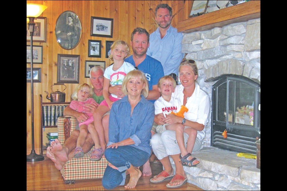The McKenna/Gilmore family at Tom and Collette Gilmore’s cottage on Lake Athapapuskow. Catherine McKenna is shown at right with her son Cormac and husband Scott Gilmore standing, back row.