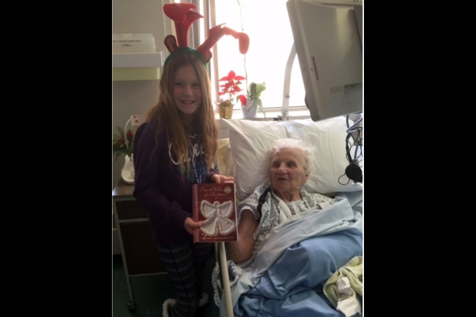 Volunteer Grace Balog delivered cookbooks to inpatients at the Yorkton Regional Health Centre.