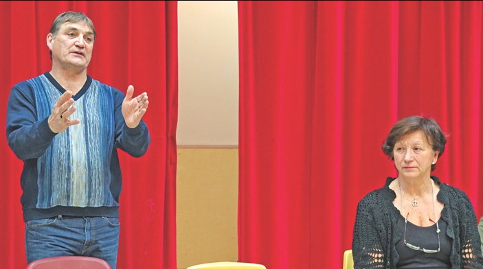 Trustee Murray Skeavington answers a question from the audience during Tuesday’s community forum on education. Seated is Trustee Angela Simpson. While the forum was open to the public, only 13 people (excluding media and school division representatives) attended.