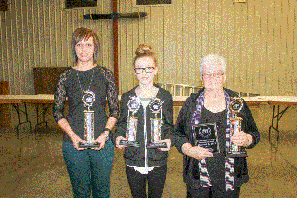 From left, Kendra Lainton, McKenna Van de Woestyne and Mary Jacobs won awards for photography.