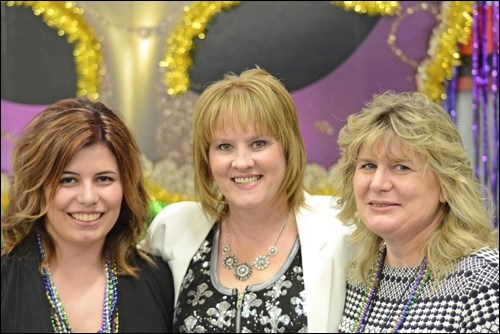 Executive director of BTEC, Mona Leece (pictured middle), was all smiles at the annual Mardi Gras fundraiser. Volunteers from around the Battlefords came to help raise funds for the new day centre. Left is Mayce Achtemichuk, right is Denise Achtemichuk. Photos by Dustin Saracini