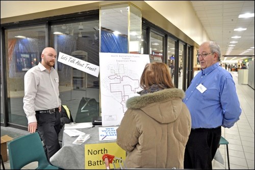 Devin MacAulay of the planning department and Transit Manager Al Love of North Battleford Transit show off some of the changes coming to the transit system at a display at Frontier Centre last Thursday afternoon. They will be back at the Territorial Place Mall between 2 and 6 p.m. this Thursday. Photo by John Cairns