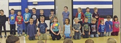 Kindergarten and Grade 1 singing at the Borden School Book Fair Feb. 2.