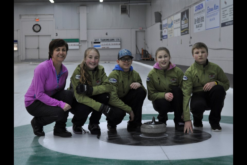 Weyburn Junior High School's Team Haupstein, with from left, coach Pamela Haupstein, skip Jaylynn Haupstein, third Kobe Kmita, second Makenna Linq and lead Oleg Vilcee, finished second out of 11 teams at the South East District Junior Mixed Curling Playdown.