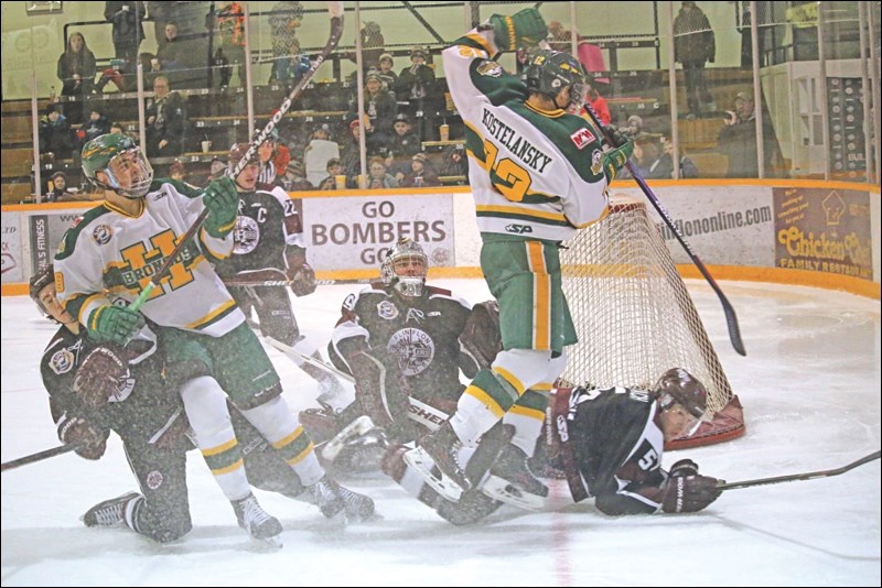 The action came fast and furious in front of Zac Robidoux’s net during the Bombers’ 8-2 blowout of the Humboldt Broncos last Friday, Feb. 5. Here the Bombers netminder keeps his eye on an airborne Laramie Kostelansky with blueliner Curtis Roach down on the ice. Nearby, blueliner Pierre-Luc Morin takes an elbow from winger Chris Van Os-Shaw. Bombers captain Tyson Empey looks on from behind. The Bombers also won Saturday and continue to eye home-ice advantage for the first round of the playoffs.