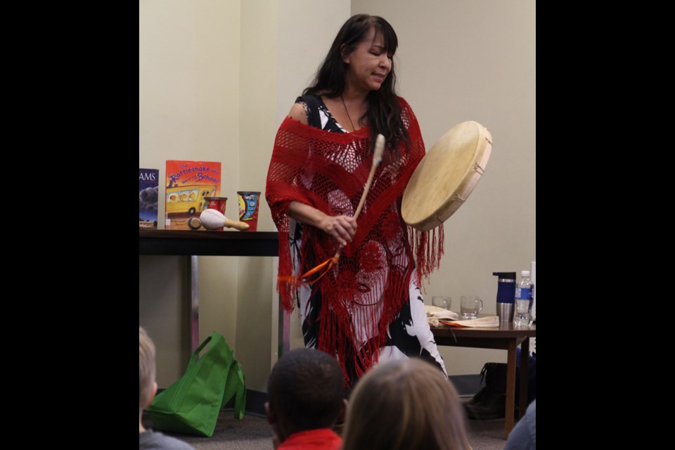 Carol Daniels opens Aboriginal Storytelling Month with a song.