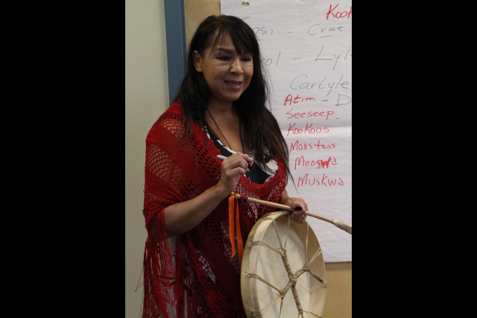 carol and Lyle Daniels talk to kids as part of Aboriginal Storytelling Month at the Yorkton Public Library.
