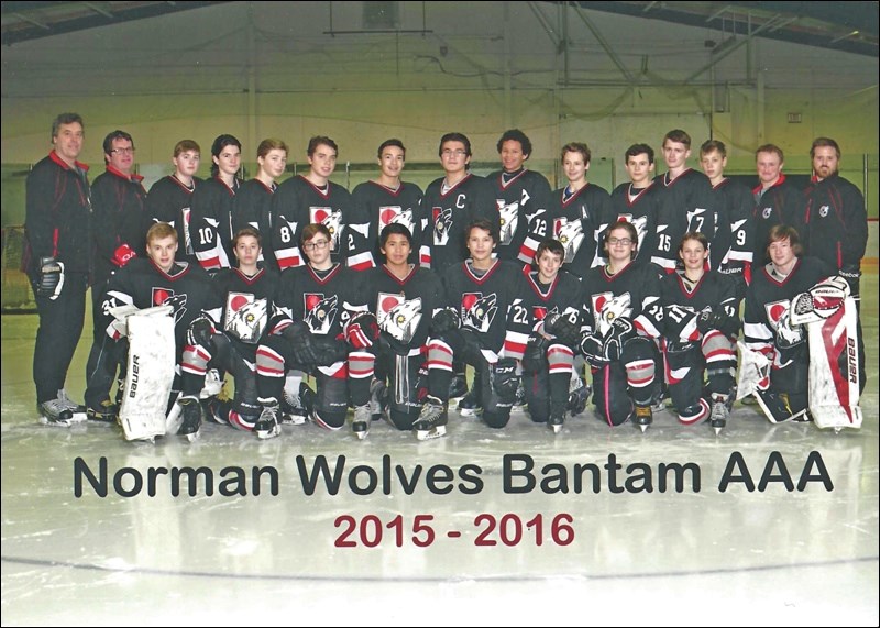 The Norman Bantam AAA Wolves, a first-year club made up of players spread across northern Manitoba, pose for a team photo.