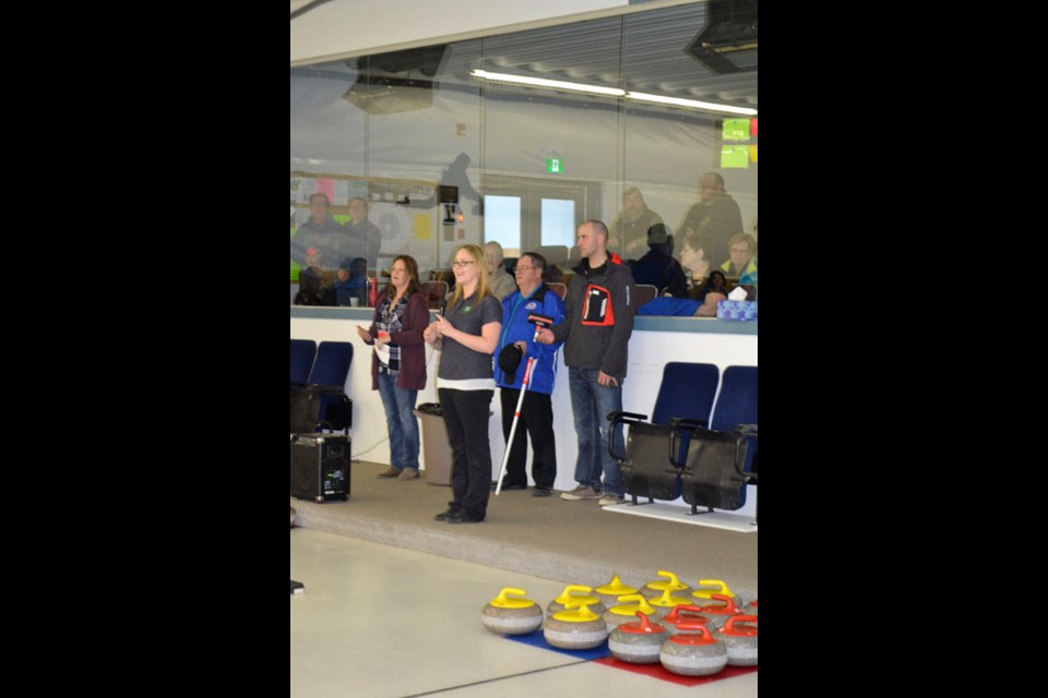 The Moose Mountain 4-H Club played host to the 4-H Provincial Curling Championship at the Arcola Curling Club February 12-14. Teresa Johnston, head of the host committee, says: “If it wasn't for the Arcola Curling Club and their willingness to host this event, we wouldn't be able to pull this off. The use of the rink, the ice-maker, the 16 different volunteer umpires who are here throughout the weekend, the kitchen vlunteers the Arcola Rink Commitee volunteers...there are so many people to thank. If it wasn't for all of these small town committees, events like this one wouldn't be possible.” Pictured (l-r) are : Johnston, Executive Director of 4-H Saskatchewan, Cera Youngson of Saskatoon, Dwain Davis of Arcola-who threw the first rock- and  Executive Mayor of Arcola, Matthew Wheeler welcoming curlers at the opening ceremonies, held Saturday, Feb. 13 in Arcola.