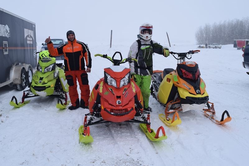 Sheldon Kozie, left, and Devon Nixon of Yorkton keep returning to the Togo snowmobile derby because they “like the terrain, have a good time and meet good people.”