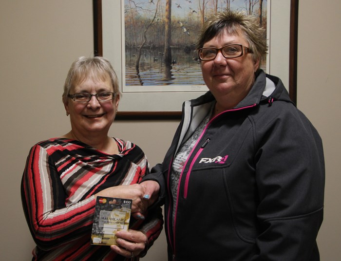 Big win – The News Review’s Health Mind and Body contest was won by Susan Semeniuk, pictured on the left receiving her prize from Penny Pearce. The prize for the contest, which ran from Jan 21 to Feb 11, 2016, was a $100 Mastercard. The winning entry was made at Dana Charbonneau-Yanke Massage Therapist.