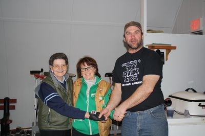 The Minnie Zimmer and Bonnie Paul rink won the Endeavour Ladies Two-on-Two Bonspiel that was held from February 17 to 19. From left, were: Zimmer and Paul and Scott Giddings who made the presentation.