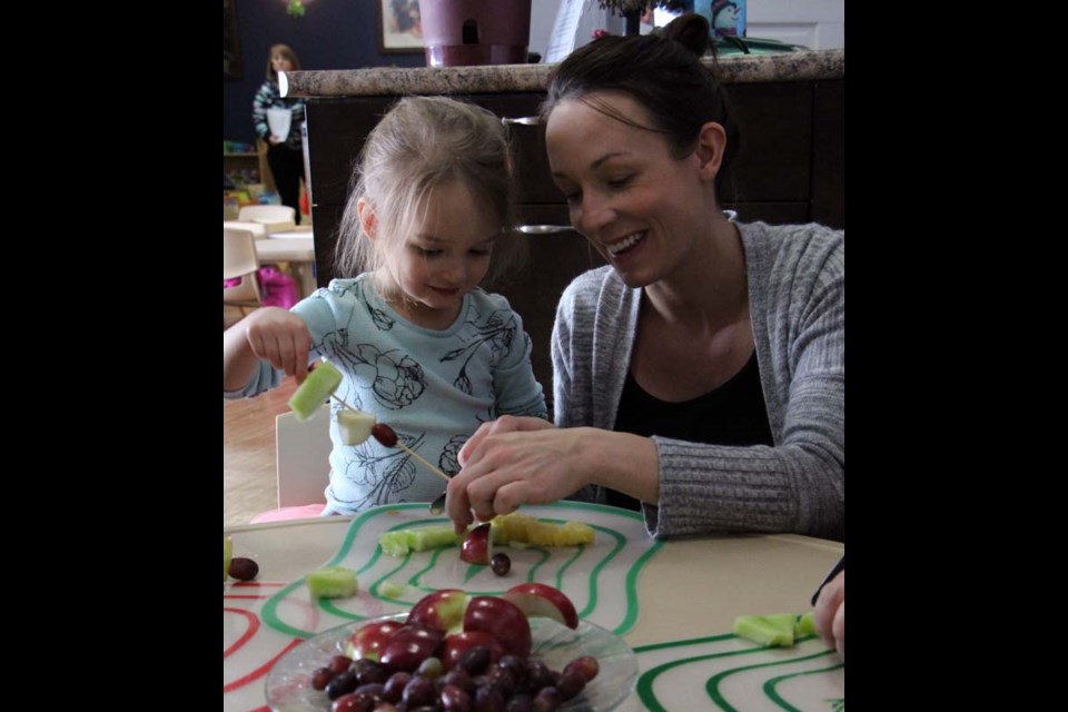 Cooking With Little Ones - Charlotte Pasloski and her mom Josie prepare some fruit kebabs as part of the Yorkton Family Resource Centre’s Cooking With Little Ones program. It’s just one of the many programs on offer for families at the centre. More information can be found at www.yorktonfrc.ca.