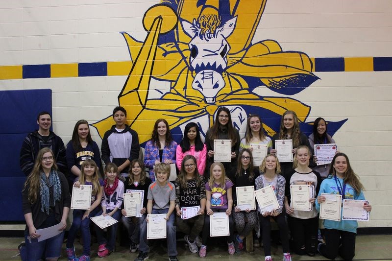 Students at the Norquay School received certificates on March 1 for their Royal Canadian Legion Remembrance Day contest entries in the categories of coloured posters, black-and-white posters, poems and essays. Recipients, from left, were: (back row) Calum Livingstone (poem), Jessica Pasieka (black-and-white poster), Koule Desjarlais (poem), Rayna Ramsay (black-and-white poster), Rhoan Alfelor (black-and-white poster), Kerri Kowch (colour poster), Keely Foster (essay), Emma Johnson (colour poster) and Haley Griffith (essay and colour poster), and (front) Cassandra Dyck (essay), Tessa Reine (colour poster), Mia Butterfield (poster), Ashlyn Olson (poster), Carson Ebert (colour poster), Abby Robinson (black-and-white poster), Sierra Dahlin (black-and-white poster), Jazmyn Papp (poem), Alexa Olson (poem), Makenna Olson (colour poster), and Allison Robinson (black-and-white poster). Tyson Lasko (essay), Amber Cox (poem) and Easton Raabel (poem) were not available for the photo.