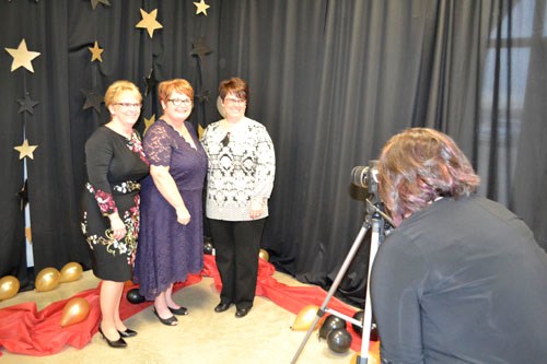 (L-r) Jayne Paton, Brenda Walter and Melinda Wyatt pause for a party pic by photographer Rachel Dayman at Arcola Daycare's Ladies' Night Out Red Carpet Event on Saturday, March 12 at Prairie Place Hall.