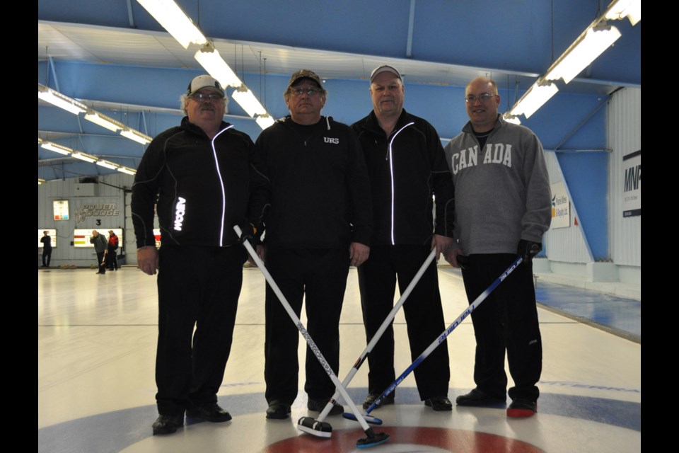 Team AECOM Estevan, with from left, skip Doug Seymore, third Lawrence Hansen, second Lloyd East and lead Stephen Krieger, won the D event at the OTS Bonspiel.
