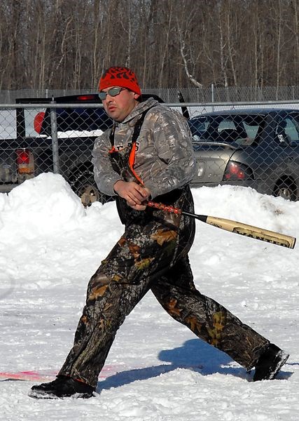 Nathan Dutchak gave the ball a ride during the sno-pitch tournament on Saturday.