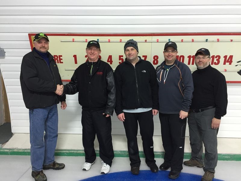 From left, Kent Zuravloff of the Buchanan Curling Club, congratulated the Bob Kolodziejski rink of Canora, with John Zbitniff, Terry Wilson and Robin Ludba, for having won the Buchanan Open Bonspiel on February 28. Two weeks earlier, the rink also won the Darrell Teslia Memorial Bonspiel.