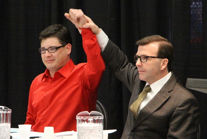 Showing up for work The two candidates who came to the Chamber of Commerce’s All Candidates Forum, Aaron C. Sinclair with the Liberal Party (left) and Greg Ottenbreit with the Saskatchewan Party (right) celebrate the beginning of the event. The candidates that showed up for the event had the opportunity to get their platform in front of the voters of the riding and meet local constituents. (See story "All Candidates Forum missing candidates").