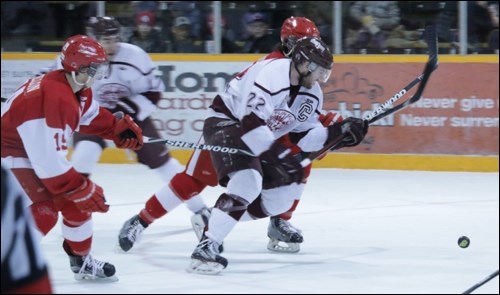 Bombers captain Tyson Empey chases the puck during Flin Flon's win on Tuesday.