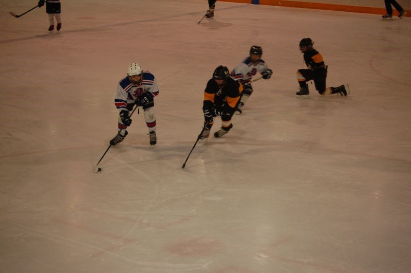Brady Kashuba and Kimmuel Albarracin fought the Churchbridge players for possession of the puck in an atom game in Preeceville on February 27.