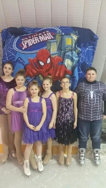 Skating to the theme Super Heros during the Endeavour figure skating ice carnival on March 4, from left, were: Skylar German, Kate Covlin, Tess Covilin, Emma Covlin, Emily Braithwaite and Tyrell Olson.