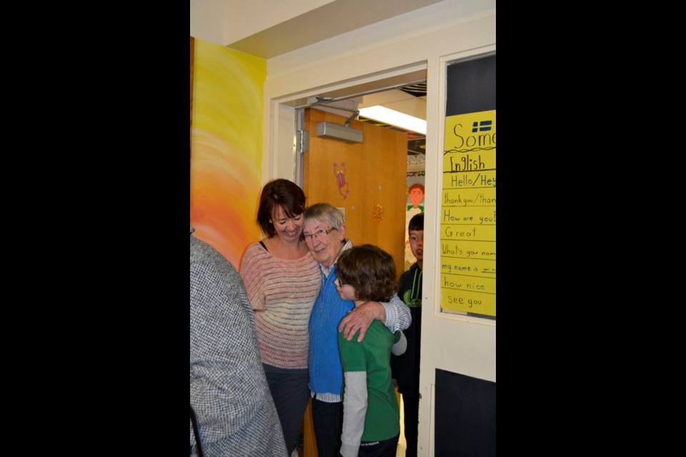 Arcola residents held a surprise community tea to celebrate “tThe Cinnamon Bun Lady” and Arcola volunteer extraordinaire, Phyllis Cameron's 85th birthday on Wednesday, March 23 at Arcola School. Cameron's contributions to the community go beyond her donations of thousands of homemade cinammon buns to local causes and individuals. In 2013, she was awarded the Saskatchewan Volunteer Medal by the province's Lieutenant Governor Vaugh Schofield. Here a surprised Cameron is greeted by teacher Jennifer Karlunchuk and student Titus Erik. “She's got such a big heart,” says Karlunchuk. “She's a sweet, sweet lady.”