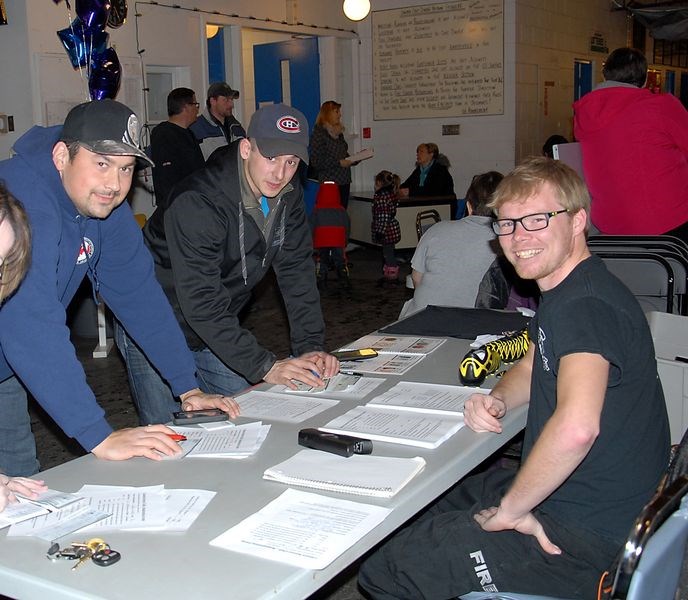 The registration table for the Canora soccer club was busy on Thursday during Canora’s mass-registration evening at the Civic Centre. From left, Nathan Dutchak and Jesse Boulanger were signing up while Dallon Leger looked after the table.