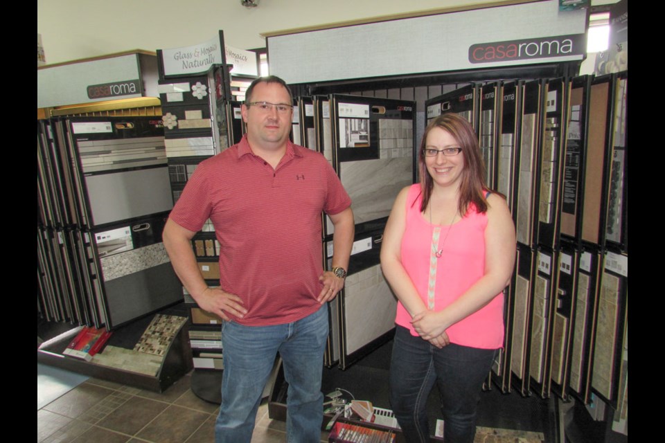 Owner Chris Tarnes, left, and sales representative Kristen Murphy.