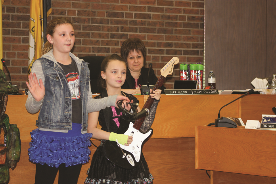 Isabelle Semenuik and Amara Pine performed Rock and Roll Band by Shel Silverstein.