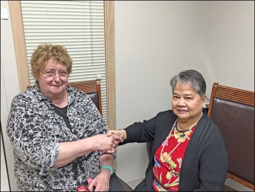 Shirley Bedford, RPN, presents a gift to Champions of Mental Health honouree Dr. Magdelena Marcelo. Photos submitted
