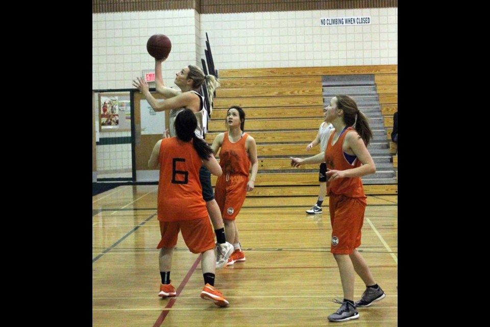 Ladies basketball was on full display for the first time at the Yorkton City Classic tournament. Here Jessica Kyle goes up to score a basket against the YRHS Lady Raiders. Kyle coaches the Raiders during the SHSAA season.