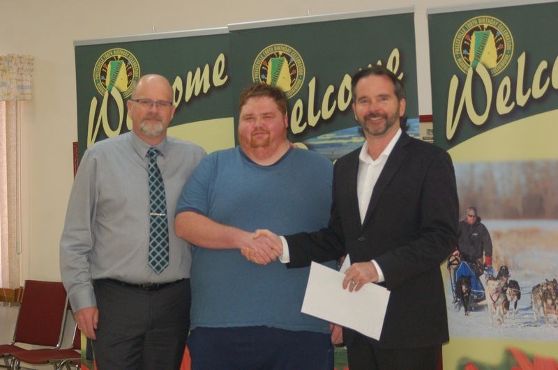 Jeremy Mattison was recognized as a dedicated volunteer for the Preeceville School coaching staff. From left, were: Doug King, Mattison and Bill Dodge.