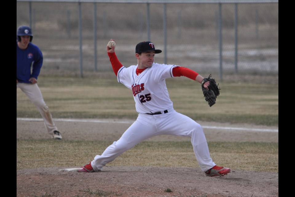 Kylar Phillips makes a throw after coming to the mound for two innings of relief work.