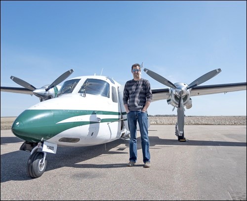 Corey Hardcastle stands beside the Turbo Commander 690.