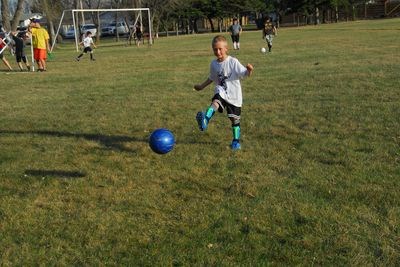 Andrew Sliva put all his power into a kick during the first day of the new soccer season on Thursday.