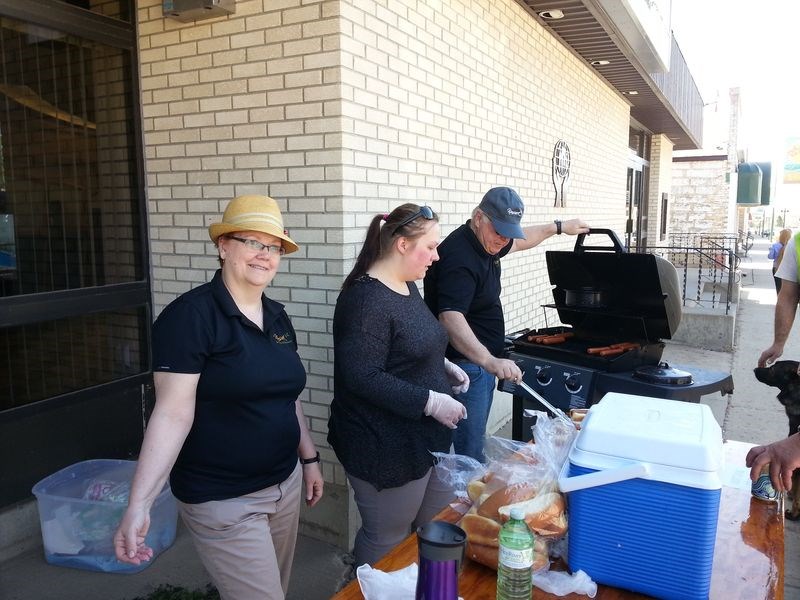 From left, Nancy Brunt, Alanna Smut and Rick Aikman were looking after the sale of barbecued hot dogs at the Credit Union building in Kamsack on May 4 when funds were raised to help stage the PARTY (Prevent Alcohol and Risk Related Trauma in Youth) event being held May 12.