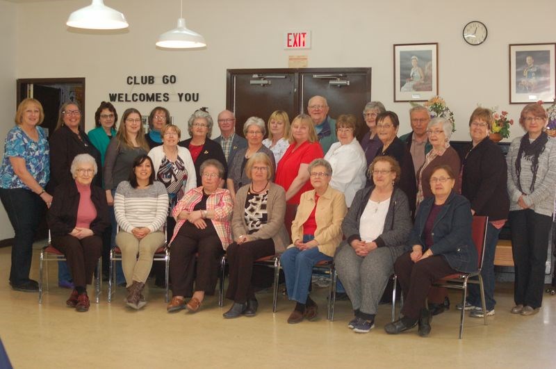 Members of the Seneca Root Association who met for their spring meeting at Preeceville on April 27, from left, were: (standing) Donna Mucha of Melville, Yvonne Hotzak of Pelly, Joan Peel of Preeceville, Ronelle Schick of Melville, Barb Wagar of Sturgis, Jackiea Rathgeber of Melville, Leona Carlson of Preeceville, John Carlson of Preeceville, Myrtle Boychuk of Sturgis, Karen Rose of Sturgis, Val Morozoff of Canora, Lorne Plaxin of Preeceville, Agnes Murrin of Preeceville, Anita Milavanov of Canora, Sharon Buchinski of Preeceville, Walter Boyko of Canora, Joy Stusek of Canora, Darlene Medlang of Preeceville and Connie McKay of Kamsack, and (seated), Dorothy Korol of Canora, May-Lin Polk of Regina, Tannis Negrave representing the National Heritage Village in Veregin, Darlene Brown (Seneca Root Museums’ networker) of Kamsack, Marge Plaxin of Preeceville, Shirley Lowe of Preeceville and Lydia Cherkas of Kamsack.