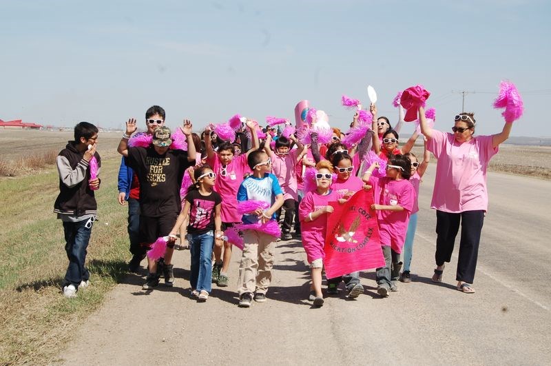Pink pompons were waved and anti-bullying slogans were chanted as Cote students marched down the highway last week as a way to bring attention to the hazards of bullying.