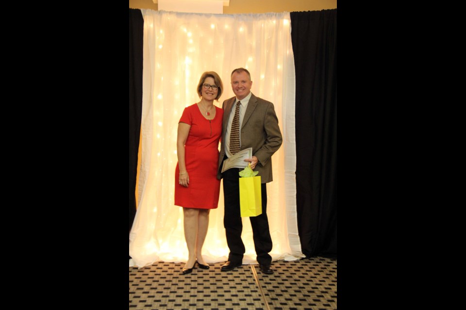 Larry Durand (Right) received the SaskEnergy Regional Champion Volunteer Award, which was presented to him by Leslie Gosselin. photo courtesy of Patti Durand