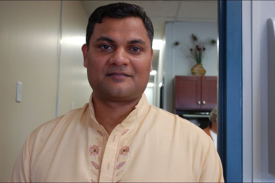 Sumit Kumar, telling his story for immigrant project.